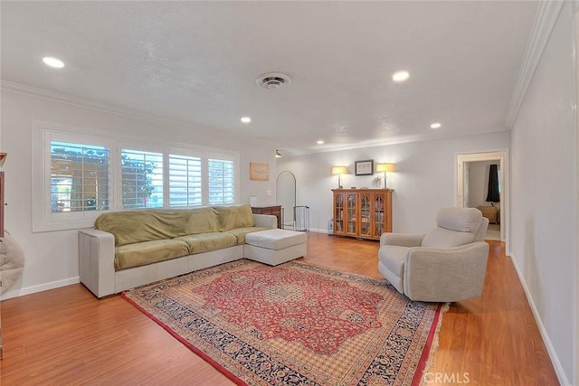 1242 2nd Pl, Calimesa, CA 92320 - living area featuring ornamental molding, wood finished floors, and recessed lighting
