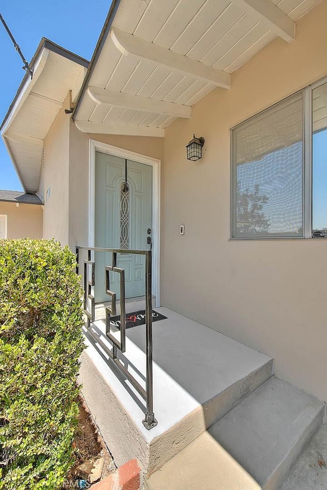 1242 2nd Pl, Calimesa, CA 92320 - property entrance featuring stucco siding