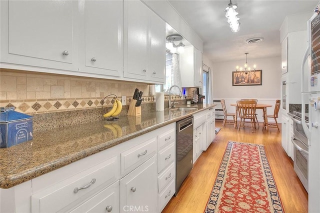 1242 2nd Pl, Calimesa, CA 92320 - kitchen with dishwasher, white cabinets, and a chandelier