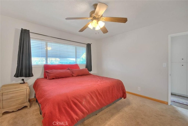 1242 2nd Pl, Calimesa, CA 92320 - bedroom with light colored carpet and ceiling fan