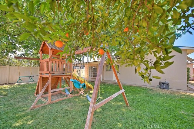 1242 2nd Pl, Calimesa, CA 92320 - view of play area with a fenced backyard
