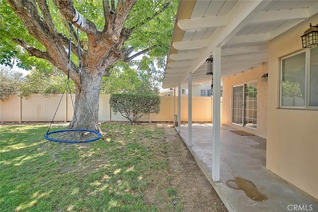 1242 2nd Pl, Calimesa, CA 92320 - fenced backyard featuring a patio area