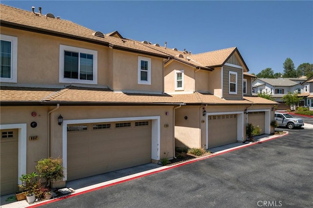 9359 Ranada Cir, Atascadero, CA 93422 - multi unit property with stucco siding, a garage, and a residential view