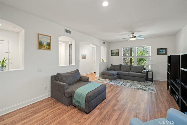 9359 Ranada Cir, Atascadero, CA 93422 - living area featuring arched walkways, ceiling fan, light wood-type flooring, and recessed lighting