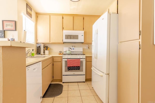 1000 Rodeo Dr Unit 515, Imperial, CA 92251 - kitchen with white appliances, light countertops, and light tile patterned flooring