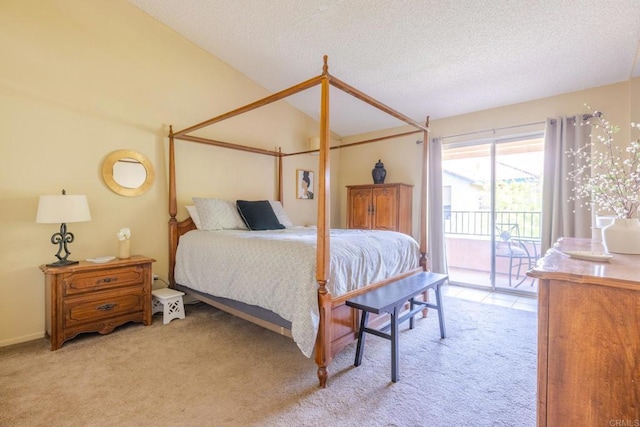 1000 Rodeo Dr Unit 515, Imperial, CA 92251 - bedroom with access to outside, light carpet, a textured ceiling, and vaulted ceiling