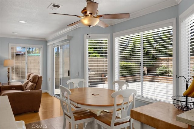 4350 Bennington Ct, Chino, CA 91710 - dining area with a ceiling fan, crown molding, healthy amount of natural light, a textured ceiling, and recessed lighting