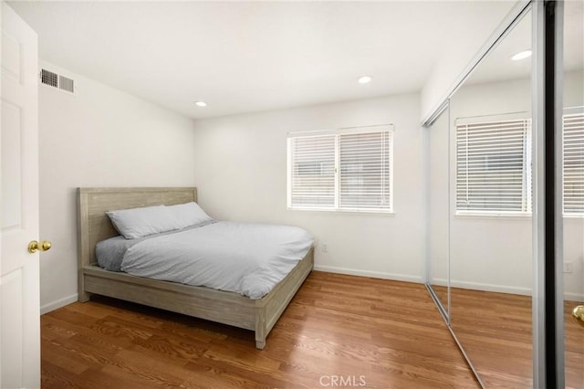 4350 Bennington Ct, Chino, CA 91710 - bedroom with wood finished floors, recessed lighting, and a closet