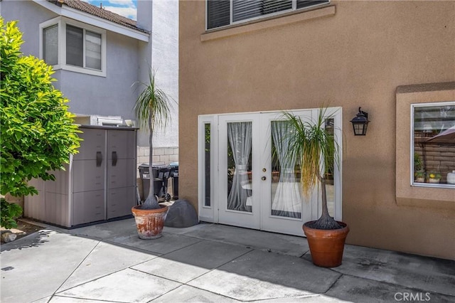 4350 Bennington Ct, Chino, CA 91710 - doorway to property with french doors, stucco siding, and a patio