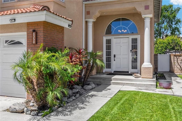 4350 Bennington Ct, Chino, CA 91710 - entrance to property featuring stucco siding, brick siding, and a garage