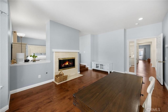 4350 Bennington Ct, Chino, CA 91710 - living room with a tiled fireplace, wood finished floors, and recessed lighting