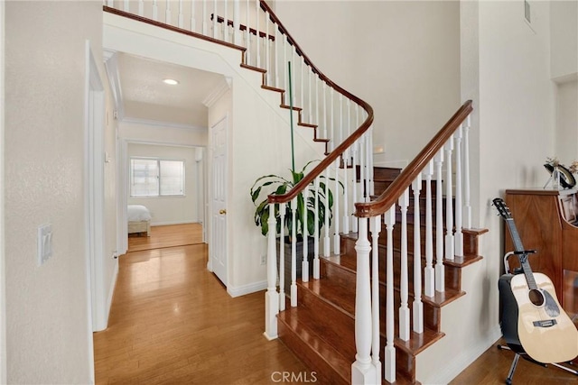 4350 Bennington Ct, Chino, CA 91710 - stairs with wood finished floors and ornamental molding