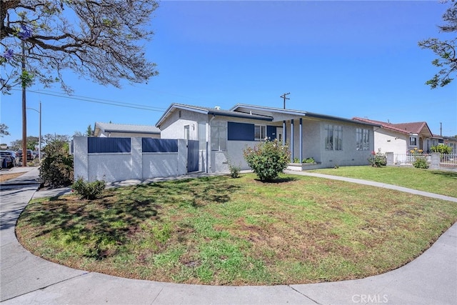 835 E 222nd St, Carson, CA 90745 - ranch-style house featuring stucco siding and a gate