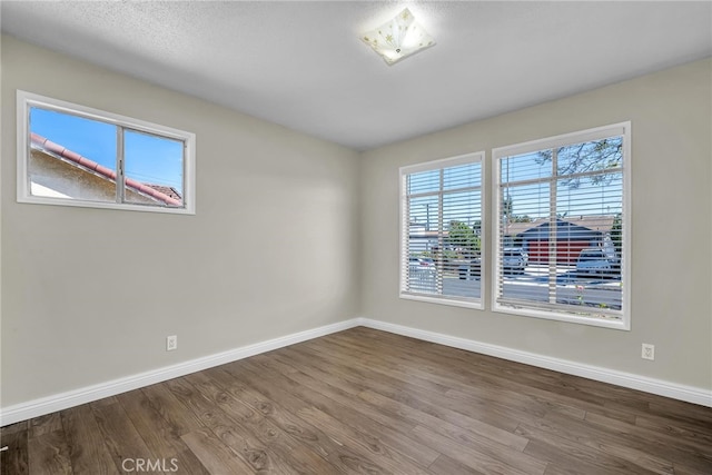 835 E 222nd St, Carson, CA 90745 - spare room featuring baseboards and wood finished floors