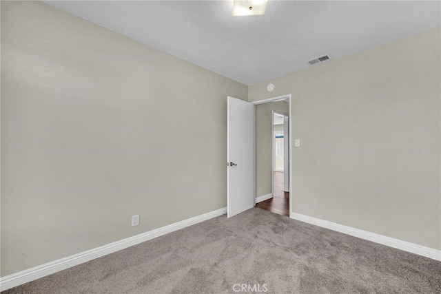 835 E 222nd St, Carson, CA 90745 - unfurnished room with carpet flooring and a textured ceiling