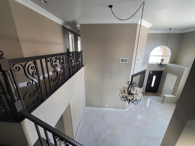 475 Marsh Harbor Dr, San Diego, CA 92154 - staircase with ornamental molding, marble look tile flooring, and a chandelier