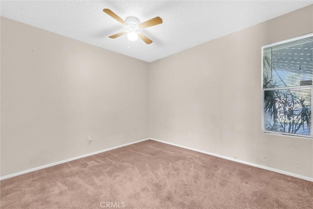 1407 Opal St, Corona, CA 92882 - empty room featuring carpet, ceiling fan, and a textured ceiling