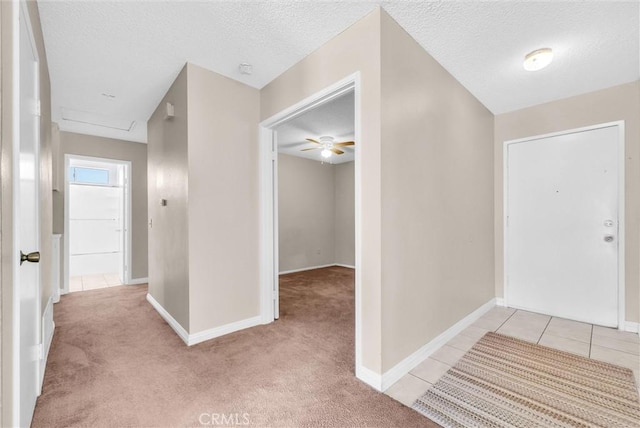 1407 Opal St, Corona, CA 92882 - hallway featuring a textured ceiling and light carpet