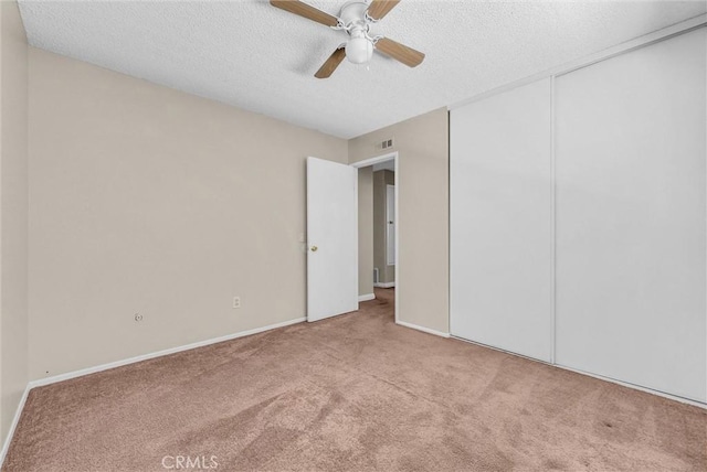 1407 Opal St, Corona, CA 92882 - unfurnished bedroom featuring carpet, a textured ceiling, and a ceiling fan
