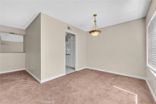 1407 Opal St, Corona, CA 92882 - carpeted spare room featuring a textured ceiling