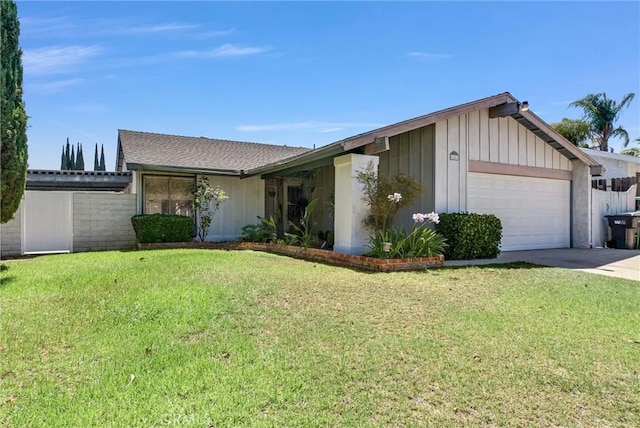 1407 Opal St, Corona, CA 92882 - view of front facade featuring a garage, a front yard, concrete driveway, and board and batten siding