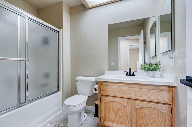 7434 Paisley Ave, Hesperia, CA 92345 - full bathroom with vanity, tile patterned floors, combined bath / shower with glass door, and a skylight