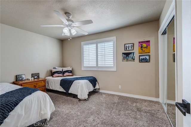 7434 Paisley Ave, Hesperia, CA 92345 - bedroom with carpet, a textured ceiling, and ceiling fan
