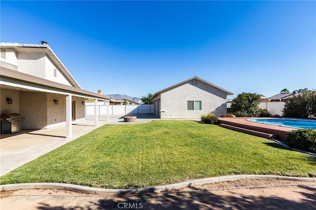 7434 Paisley Ave, Hesperia, CA 92345 - fenced backyard with a patio area
