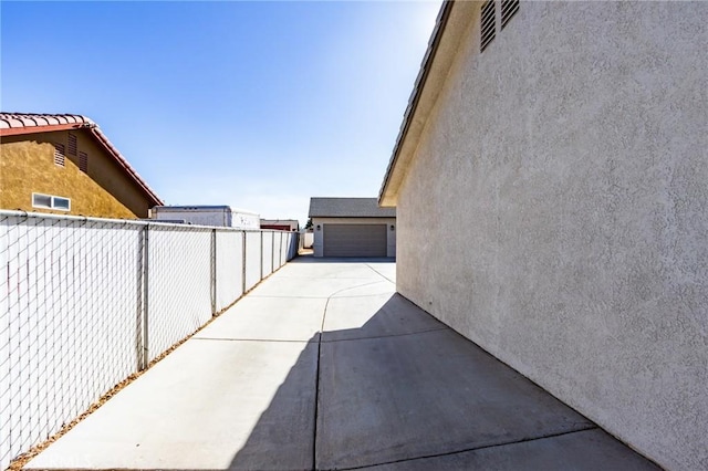 7434 Paisley Ave, Hesperia, CA 92345 - view of property exterior featuring stucco siding and a garage