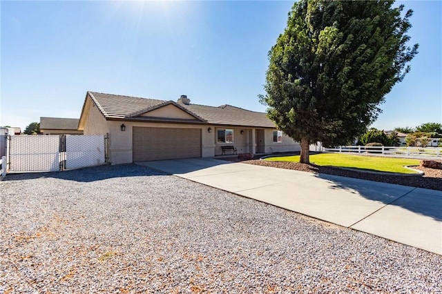 7434 Paisley Ave, Hesperia, CA 92345 - ranch-style house featuring driveway, an attached garage, a tile roof, stucco siding, and a chimney