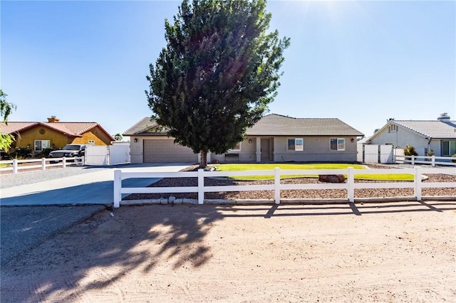 7434 Paisley Ave, Hesperia, CA 92345 - view of front of house with driveway and an attached garage