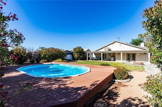 7434 Paisley Ave, Hesperia, CA 92345 - swimming pool featuring french doors and a patio area