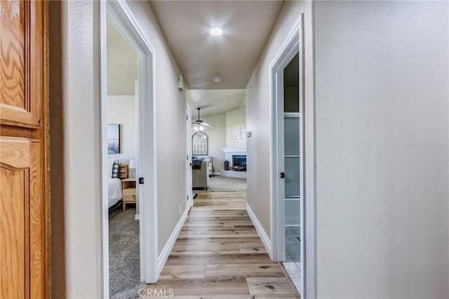 7434 Paisley Ave, Hesperia, CA 92345 - hallway featuring light wood finished floors and baseboards
