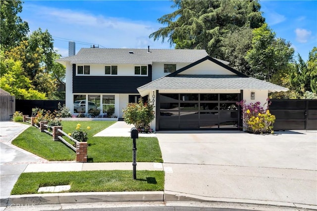 1061 Colby Cir, Thousand Oaks, CA 91362 - view of front facade with driveway, a shingled roof, a garage, and stucco siding
