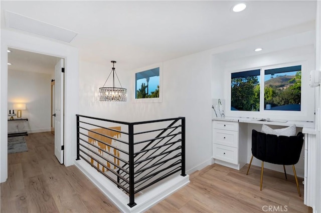 1061 Colby Cir, Thousand Oaks, CA 91362 - hallway with an upstairs landing, light wood-style floors, a desk, recessed lighting, and a chandelier