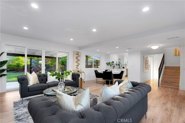1061 Colby Cir, Thousand Oaks, CA 91362 - living room featuring stairway, recessed lighting, and light wood-style flooring