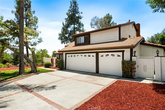 963 Dare Ct, Diamond Bar, CA 91765 - view of front facade featuring a tiled roof, a garage, and stucco siding