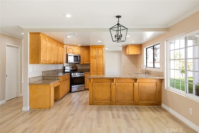 963 Dare Ct, Diamond Bar, CA 91765 - kitchen featuring appliances with stainless steel finishes, ornamental molding, a peninsula, light wood-style flooring, and light stone countertops