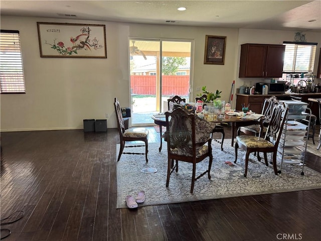 1465 Ardith Ct, Beaumont, CA 92223 - dining space with dark wood-style floors, healthy amount of natural light, and recessed lighting