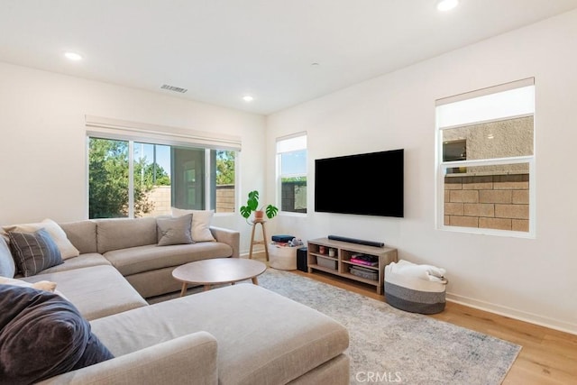 4835 S Cora Way, Ontario, CA 91762 - living area featuring wood finished floors and recessed lighting