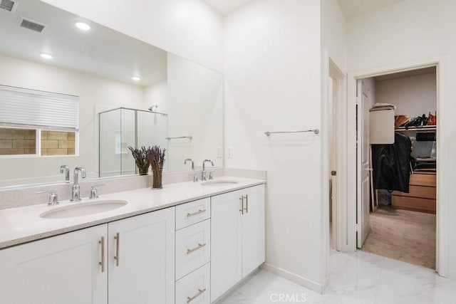 4835 S Cora Way, Ontario, CA 91762 - bathroom with marble finish flooring, a shower stall, a spacious closet, double vanity, and recessed lighting