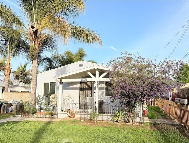 3537 Maine Ave, Baldwin Park, CA 91706 - rear view of property featuring covered porch and stucco siding