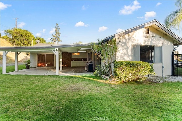 16401 Gothic Pl, Granada Hills, CA 91344 - back of property featuring a patio area and stucco siding