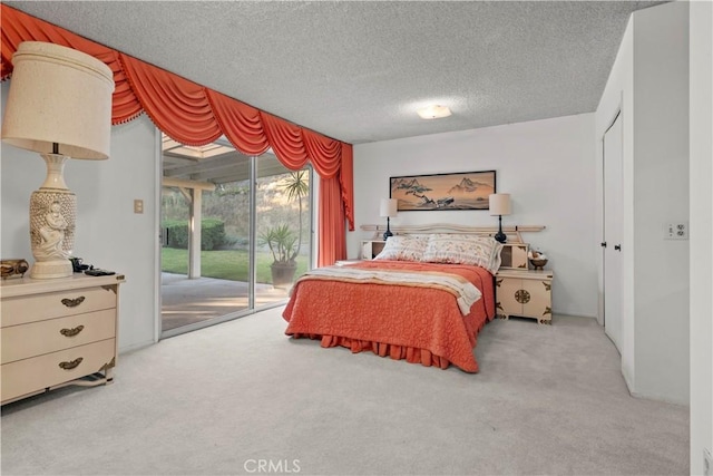 16401 Gothic Pl, Granada Hills, CA 91344 - bedroom with access to outside, carpet, and a textured ceiling