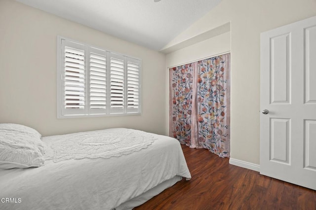7748 Paso Robles St, Ventura, CA 93004 - bedroom with lofted ceiling, wood finished floors, and a closet