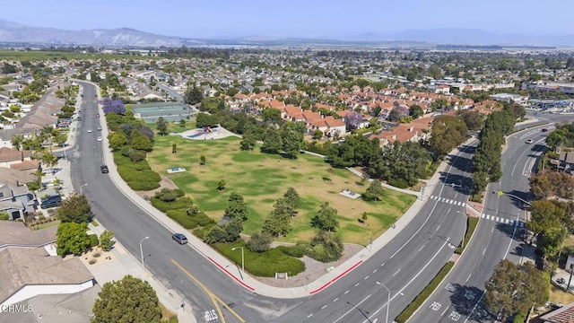 7748 Paso Robles St, Ventura, CA 93004 - aerial overview of property's location with a mountain backdrop and nearby suburban area