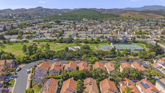 7748 Paso Robles St, Ventura, CA 93004 - aerial overview of property's location with nearby suburban area and a mountain backdrop