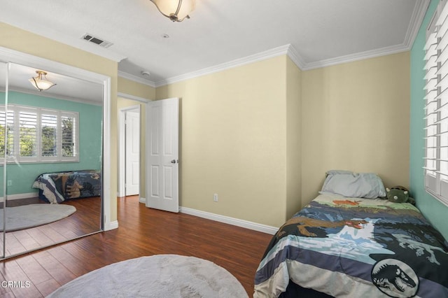 7748 Paso Robles St, Ventura, CA 93004 - bedroom with wood finished floors and crown molding