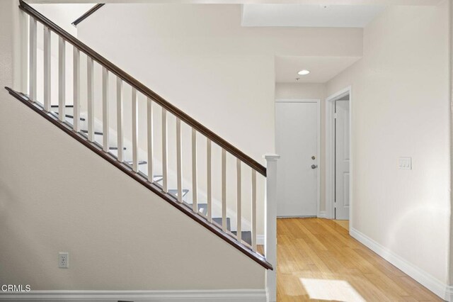 7748 Paso Robles St, Ventura, CA 93004 - stairs featuring wood finished floors and baseboards