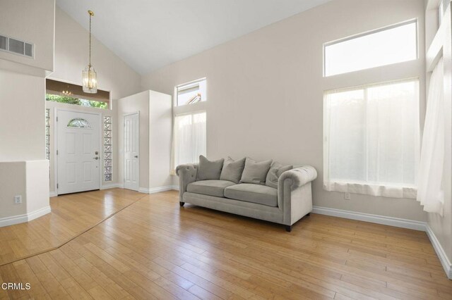 7748 Paso Robles St, Ventura, CA 93004 - entryway with high vaulted ceiling and light wood-type flooring